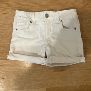 Selling these American Eagle Ne(x)t Level Stretch X White denim shorts in size 0